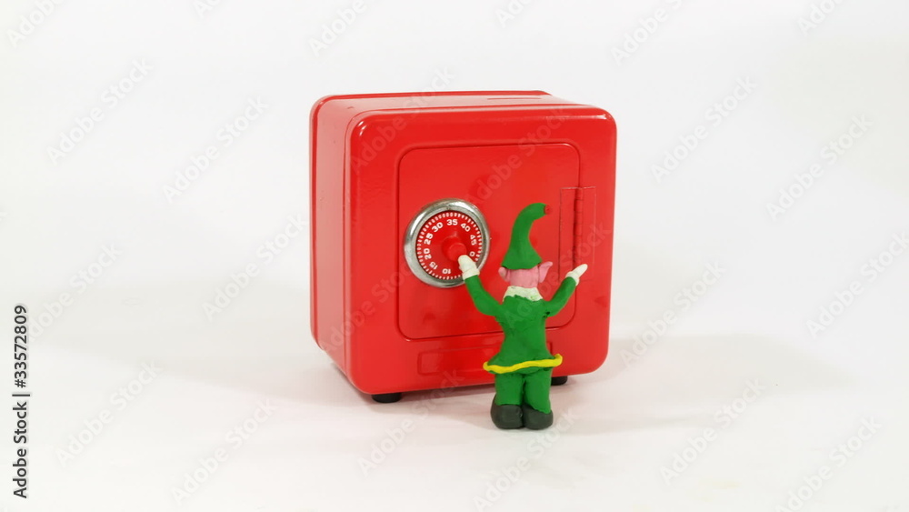 Claymation Elf helps Santa open a safe full of gifts. Claymation Elf helps Santa open a safe full of gifts.