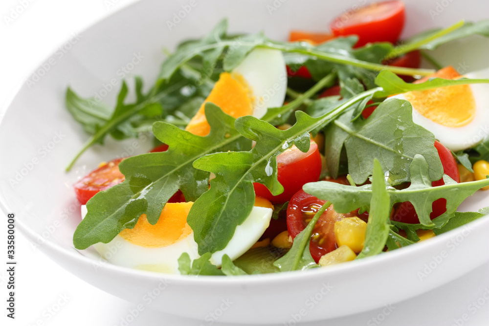 healthy rocket salad with tomatoes and eggs