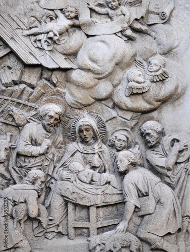 Holy Family, carved in stone on the monument