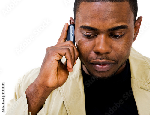 Close-up of a man talking on mobile