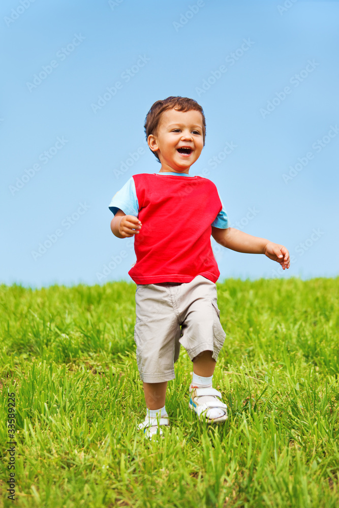 Joyful kid running