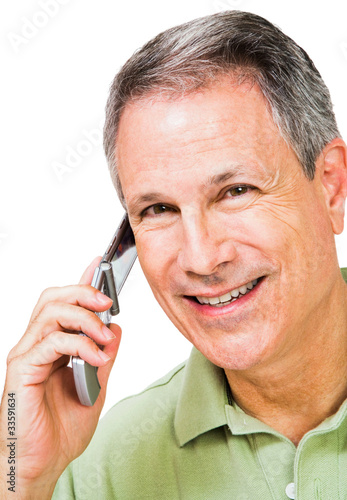 Smiling man talking on mobile