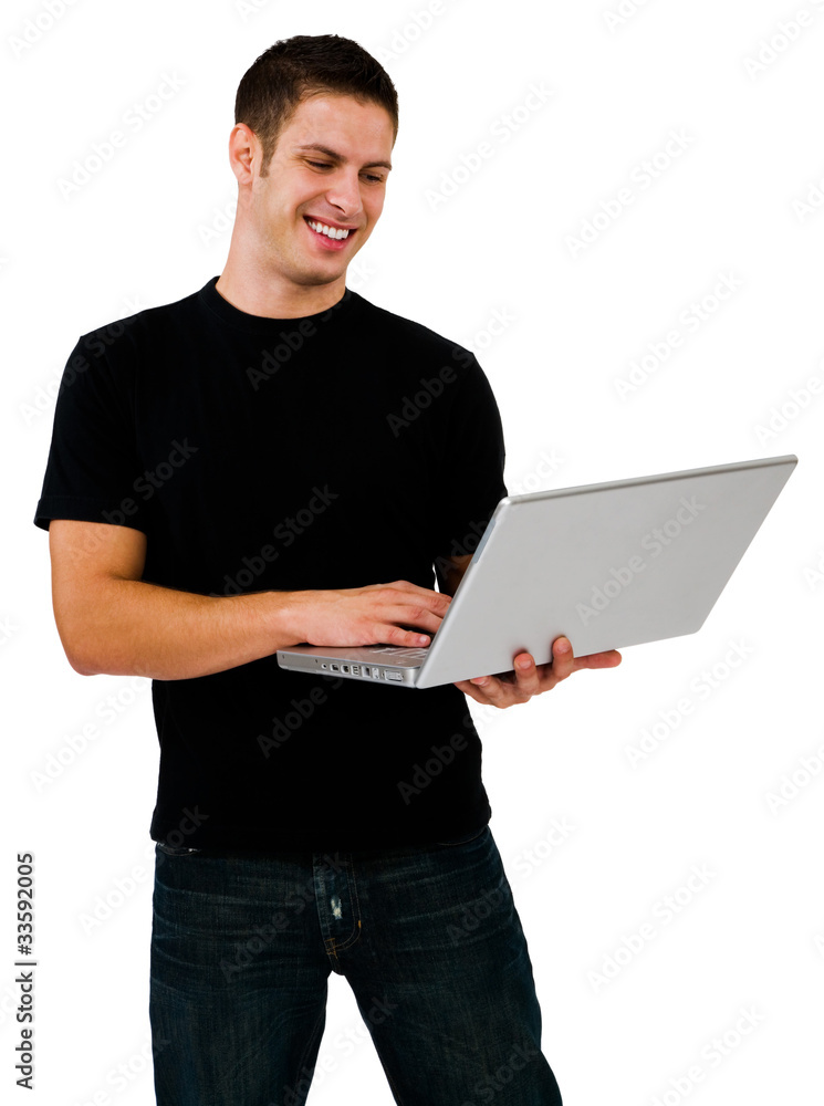 Smiling man using a laptop Smiling man using a laptop