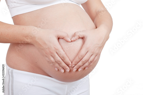 Wallpaper Mural Pregnant woman hold hands on a belly like heart Torontodigital.ca