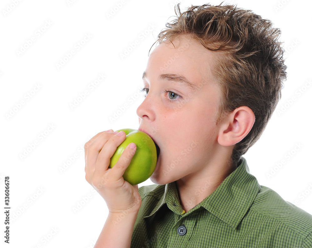 Boy holding an apple Boy holding an apple