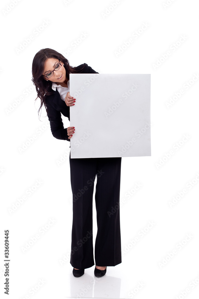 beautiful business woman holding a blank billboard beautiful business woman holding a blank billboard