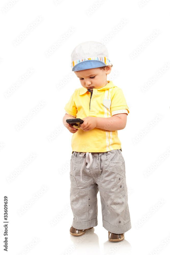 boy playing with a mobile phone boy playing with a mobile phone