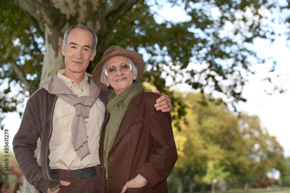 Fototapeta premium elderly couple in the forest