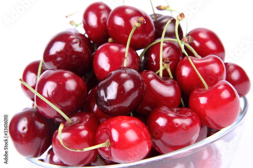 Bowl of Cherry fruits on a white background