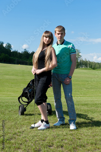 Couple on golf field