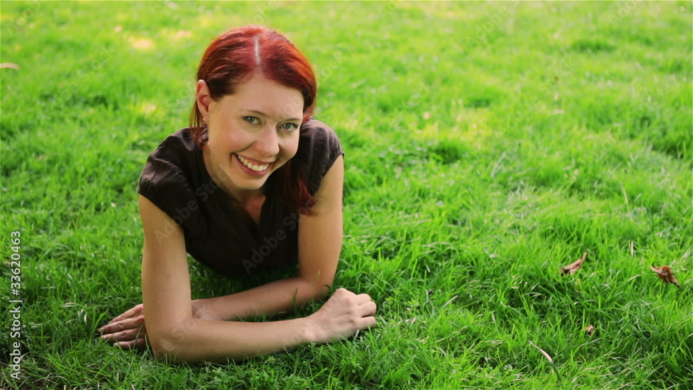 Happy woman in nature holding thumbs up Happy woman in nature holding thumbs up