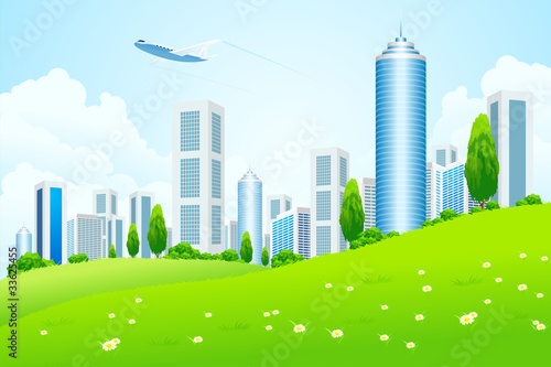 Green landscape with city