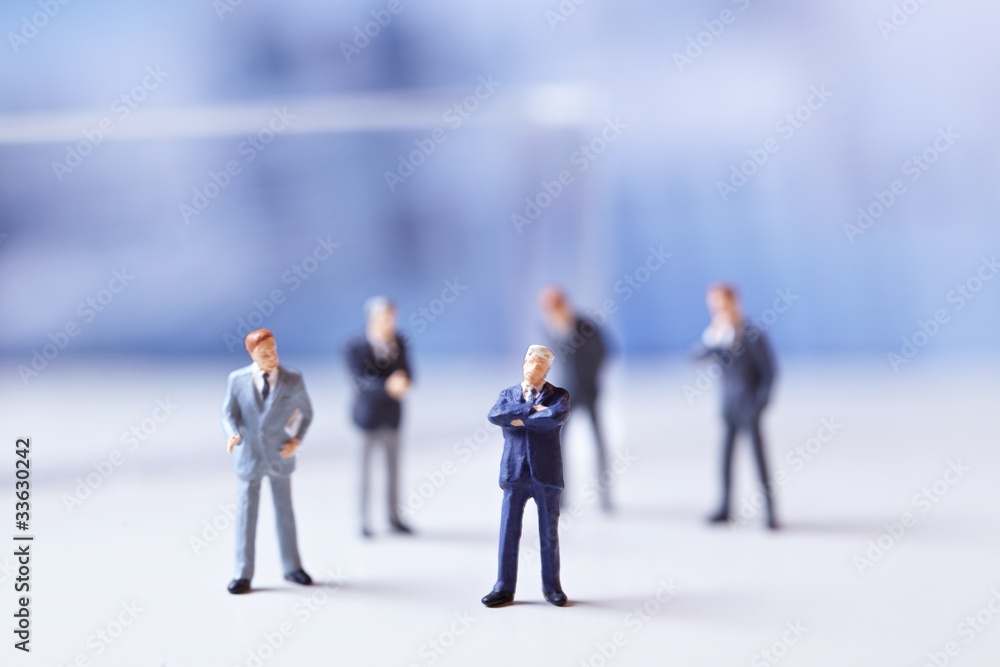 Miniature figurines of successful business team. Miniature figurines of successful business team.