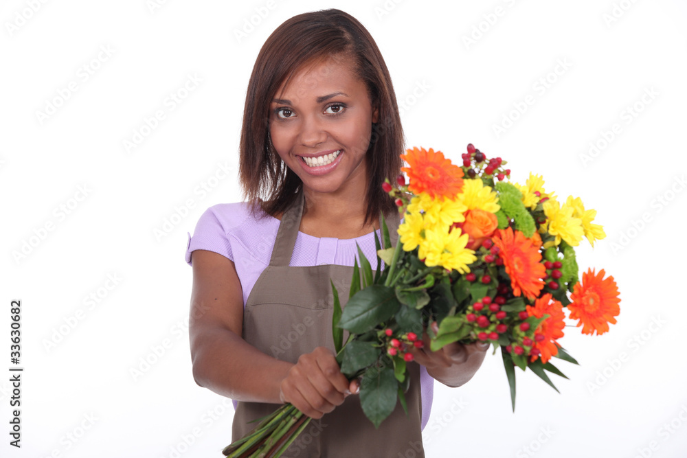 young black female florist taking a flowers bouquet young black female florist taking a flowers bouquet