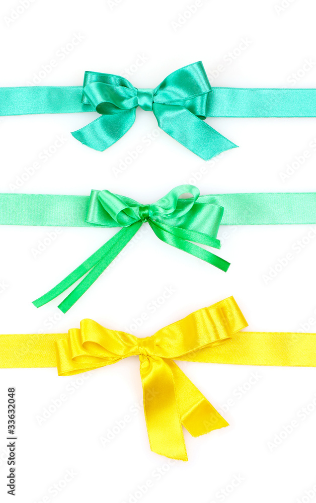 Color ribbons and bow isolated on white background