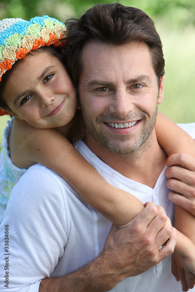Fototapeta premium Girl on father's back