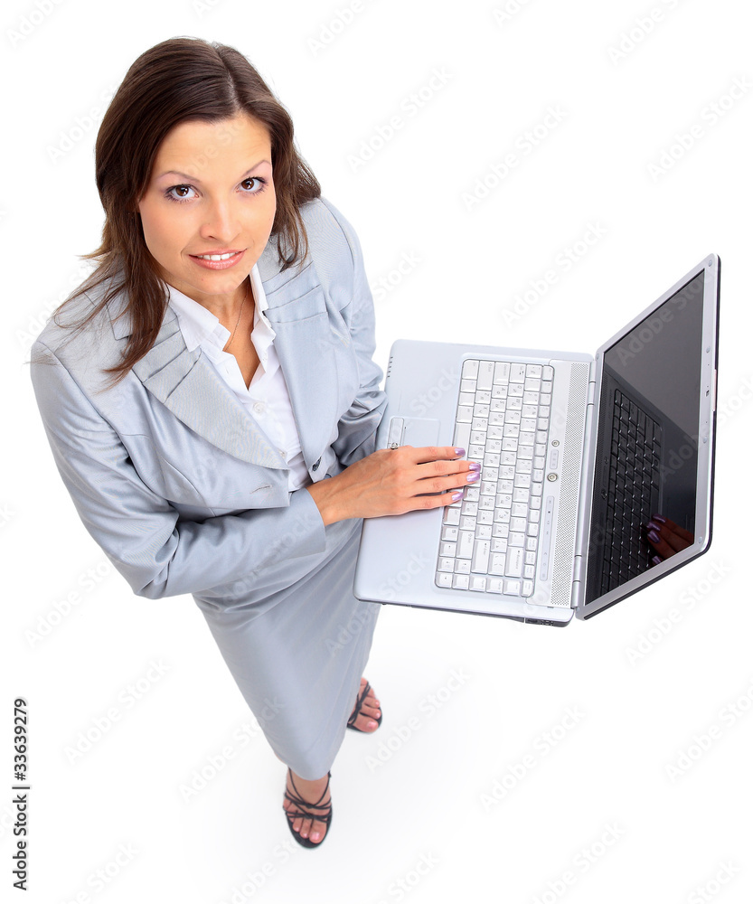 Beautiful businesswoman working on the lapto Beautiful businesswoman working on the lapto