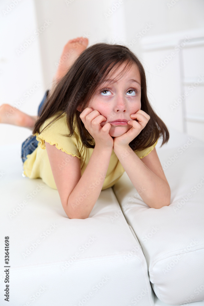 Portrait of little girl with bored expression Portrait of little girl with bored expression