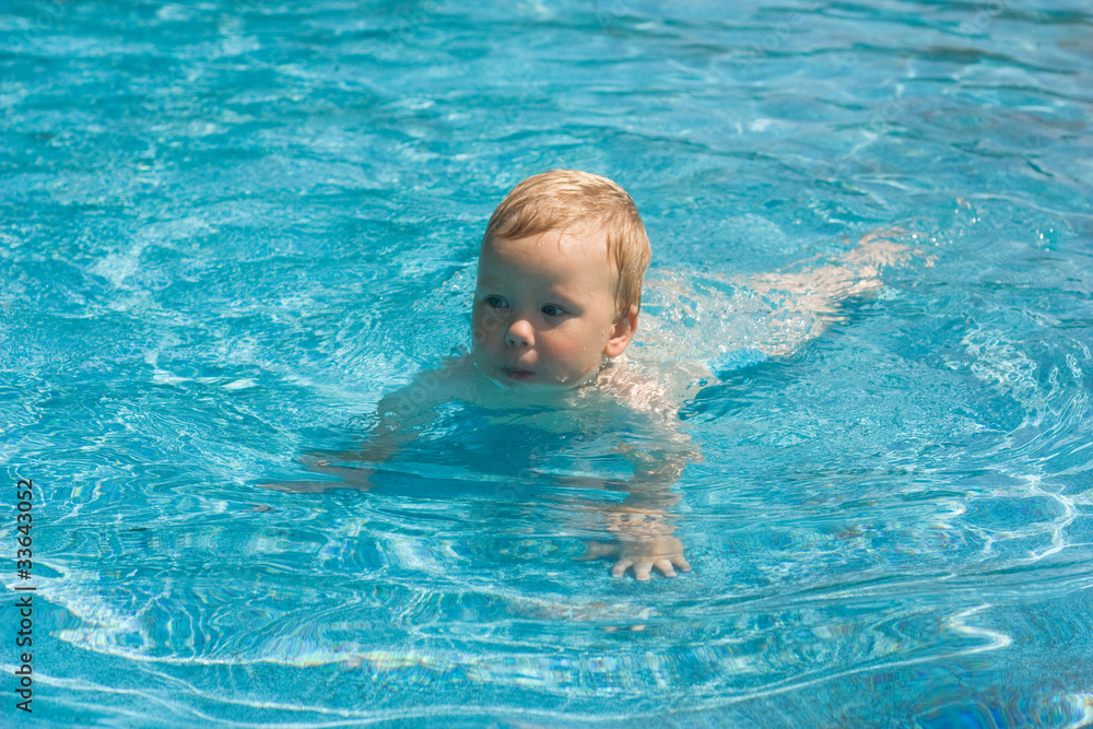 child in a swimming pool