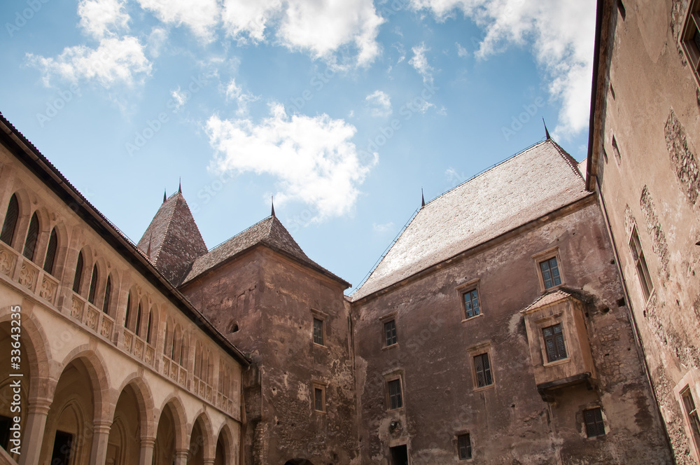 Upward view of the medieval stone castle Upward view of the medieval stone castle