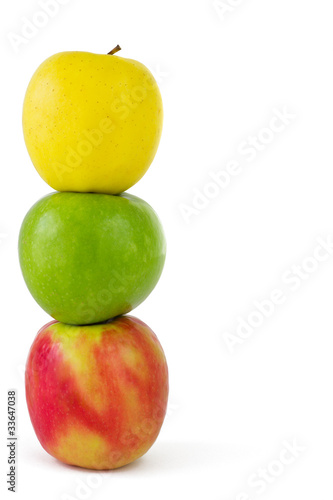 Stack of three colorful apples