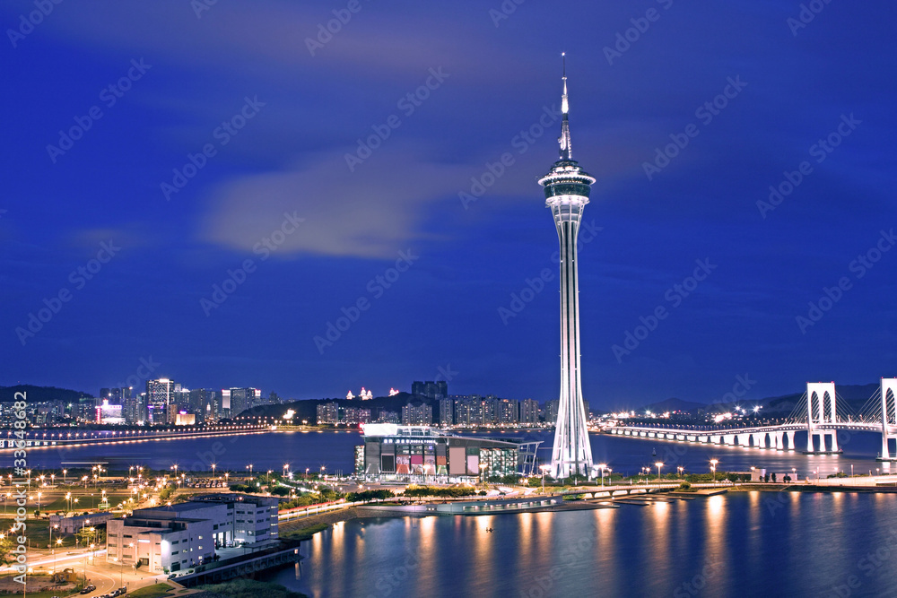 Urban landscape of Macau with famous traveling tower under sky n