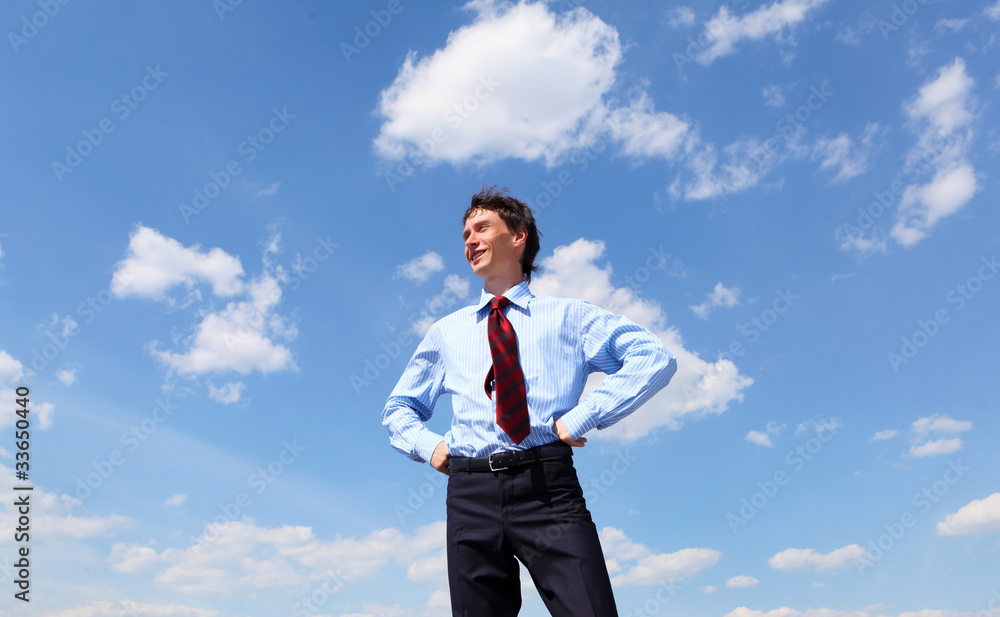 young business man in a blue shirt and red tie young business man in a blue shirt and red tie