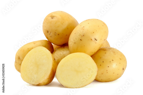 Pile of fresh potatoes isolated on white background