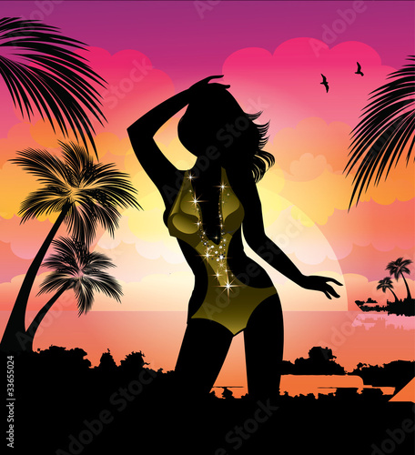 Woman silhouette at tropical sunset beach