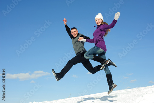 Two teenagers jumping