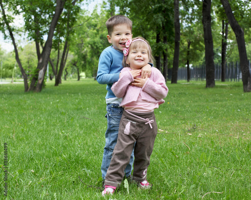 Fototapeta premium happy sister and brother outdoors