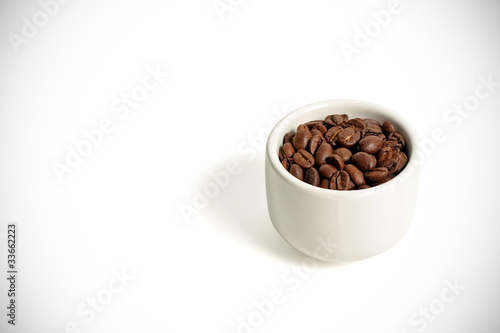 cup with coffee beans
