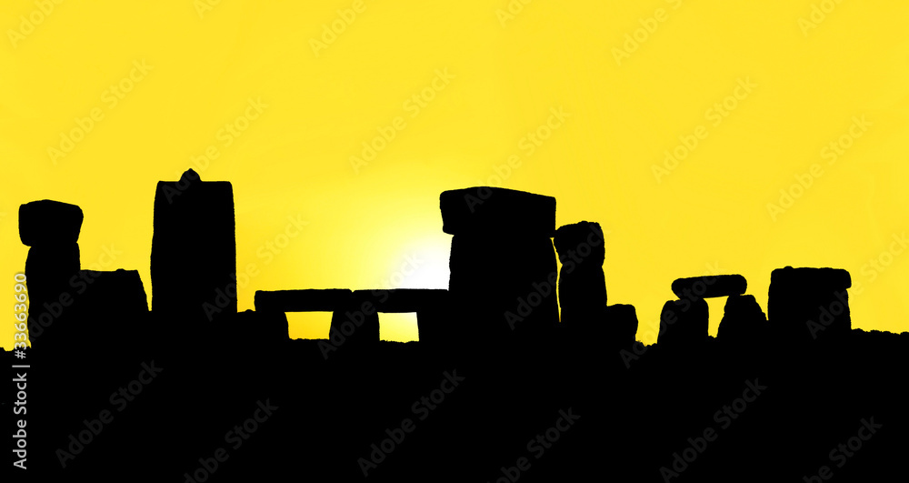 Silhouette of the Stonehenge against a sunrise