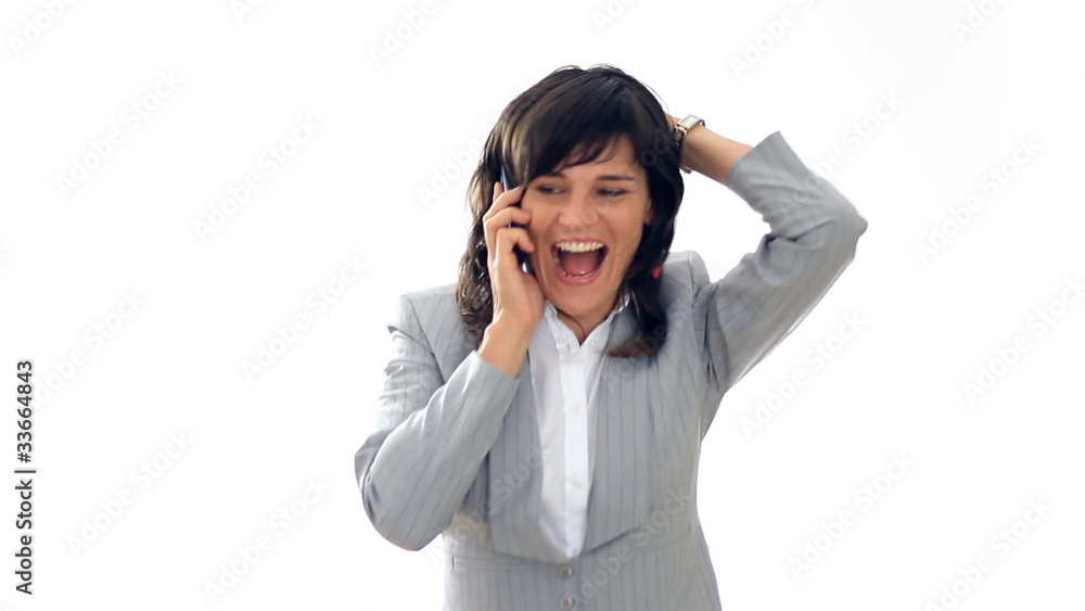 Exited businesswoman receiving great news on the phone, isolated Exited businesswoman receiving great news on the phone, isolated