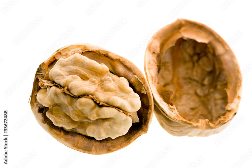 The walnut broken on two half (isolated) The walnut broken on two half (isolated)