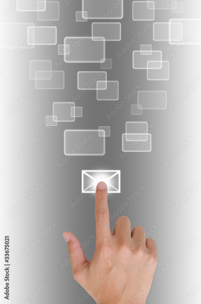 hand pushing a button email on a touch screen interface. hand pushing a button email on a touch screen interface.