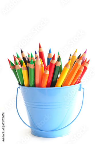 Blue bucket with color pencils