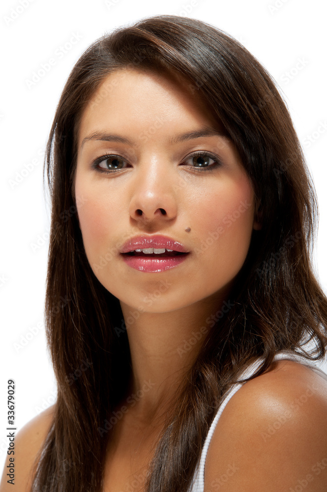 Pretty young female against white