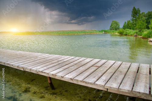 Wooden pier on beautiful lake.Nature composition.