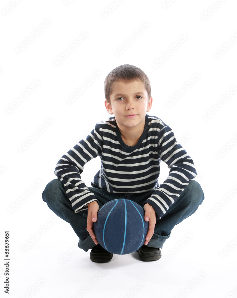 Boy holding a ball