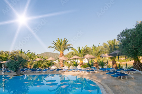 Resort, azure swimming pool.