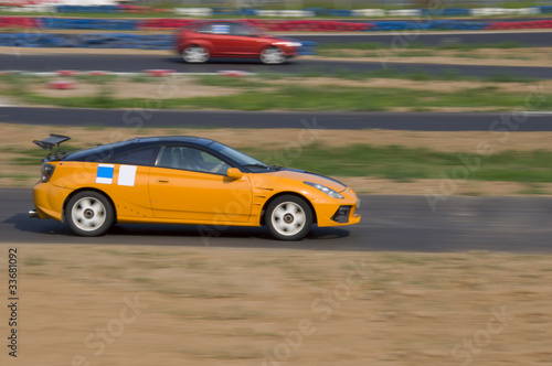 Fast car in a race © svand
