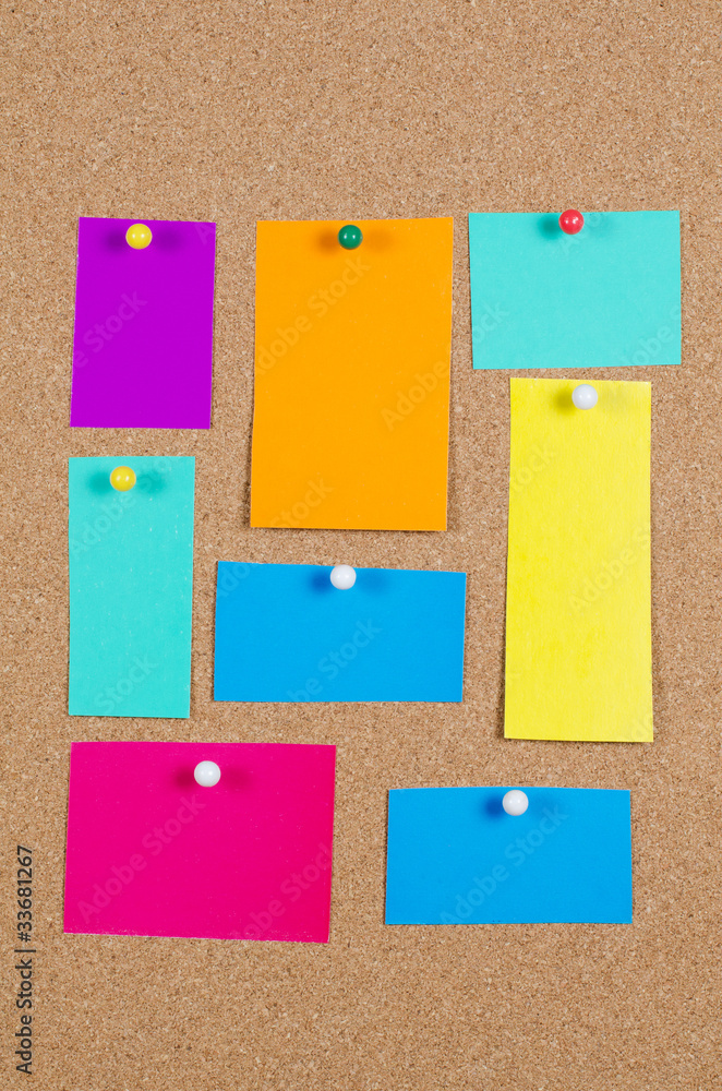 collection of note papers on corkboard collection of note papers on corkboard