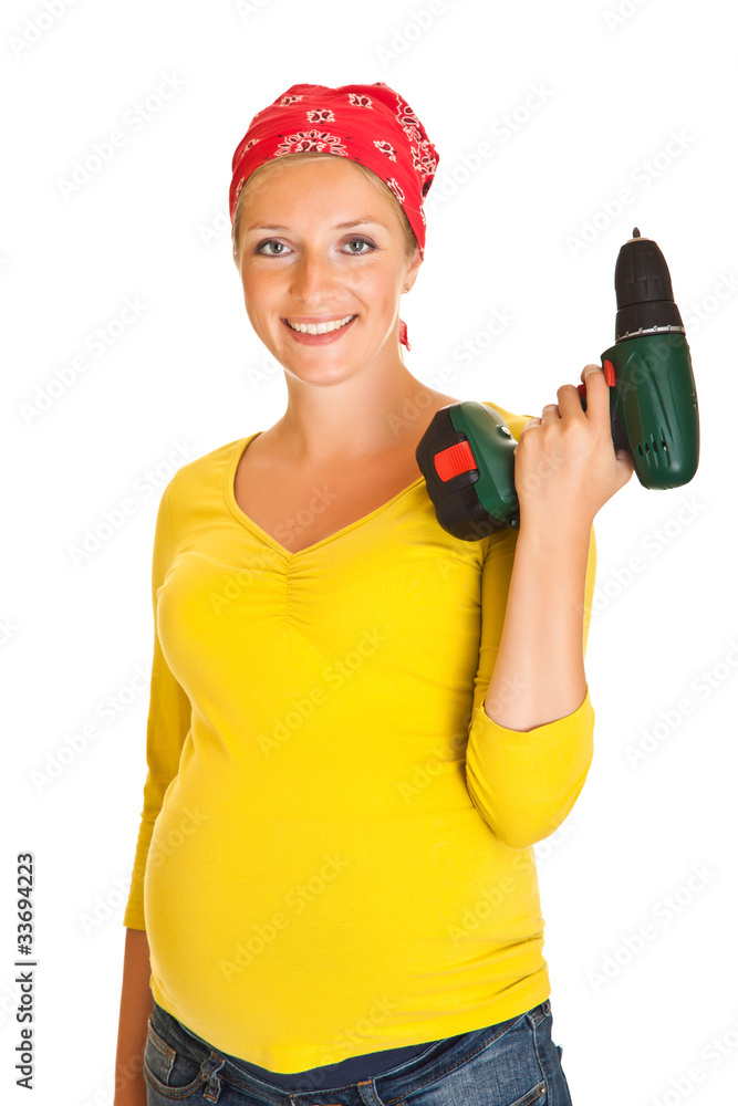 Pregnant woman with powertools isolated on white Pregnant woman with powertools isolated on white