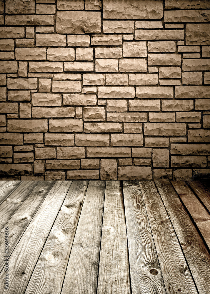 stone wall and wooden floor
