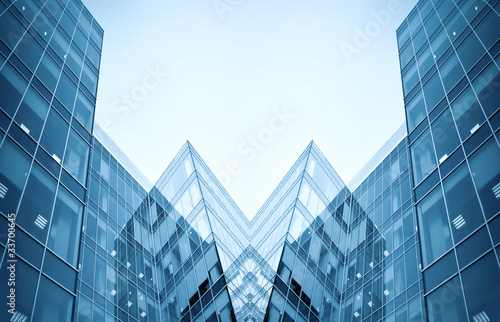 glass silhouettes of skyscrapers at night
