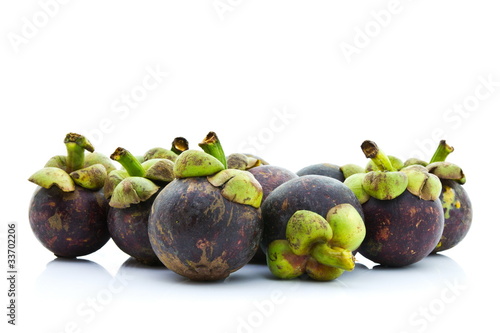 Tropical mangosteen isolated on white background