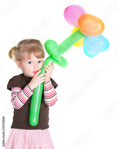 Little girl with baloons flower
