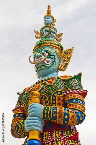 Guardian statue at the temple in Thailand .