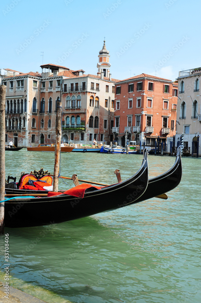 View of the Grand Canal in Venice with a two gondolas.